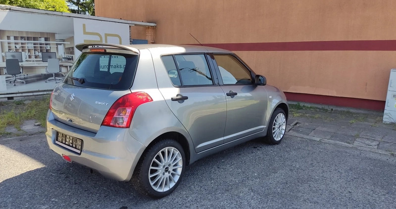 Suzuki Swift cena 14900 przebieg: 150000, rok produkcji 2009 z Lidzbark małe 277